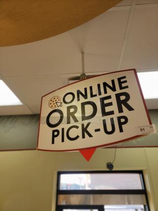5' x 32" 'Online Order Pick Up' Sign - Direct Your Digital Customers! Guide your online customers seamlessly with this prominent 5-foot by 32-inch 'Online Order Pick Up' Sign, perfect for businesses with takeout, curbside, or in-store pickup services. This large, highly visible sign ensures your digital customers know exactly where to go to retrieve their orders, making their experience smooth and efficient. *BUYER MUST REMOVE - NO SHIPPING OR HANDLING AVAILABLE*