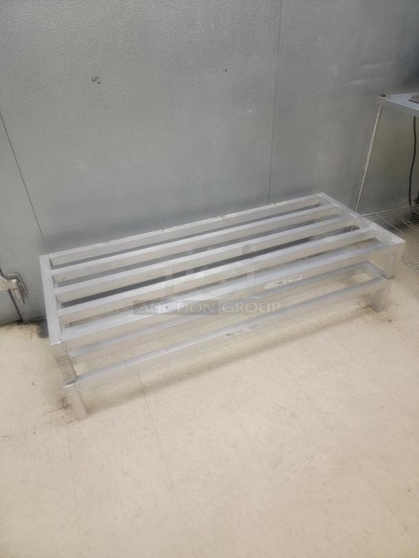 (2) New Age 5' 2020 Low Profile Dunnage Rack - Elevate Your Storage! Need to store items off the floor to meet health codes or prevent damage? This New Age 5-foot 2020 Low Profile Dunnage Rack is the perfect solution for organized, sanitary, and compliant storage!

Ideal for commercial kitchens, warehouses, dry storage areas, and more. Keep your valuable inventory safe and accessible while meeting critical sanitation requirements. *BUYER MUST REMOVE - NO SHIPPING OR HANDLING AVAILABLE* - Image 3 of 3