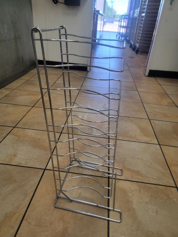 27" Heavy Duty Chrome Pizza Pan Rack - Maximize Your Pizza Output! Streamline your pizza production and storage with this robust 27-inch Heavy Duty Chrome Pizza Pan Rack, an essential piece of equipment for any pizzeria, restaurant, or high-volume kitchen that needs efficient storage and cooling for pizza pans. *BUYER MUST REMOVE - NO SHIPPING OR HANDLING AVAILABLE* - Image 1 of 2
