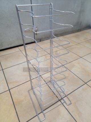 27" Heavy Duty Chrome Pizza Pan Rack - Maximize Your Pizza Output! Streamline your pizza production and storage with this robust 27-inch Heavy Duty Chrome Pizza Pan Rack, an essential piece of equipment for any pizzeria, restaurant, or high-volume kitchen that needs efficient storage and cooling for pizza pans. *BUYER MUST REMOVE - NO SHIPPING OR HANDLING AVAILABLE*
