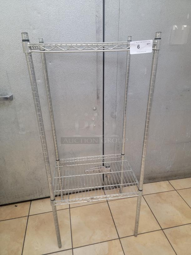 Eagle Wire Shelving Unit - 2'x18"x55" - Perfect for Any Space!
Looking for durable, versatile shelving? This Eagle wire shelving unit is ideal for organizing your home, garage, office, or retail space. *BUYER MUST REMOVE - NO SHIPPING OR HANDLING AVAILABLE* - Image 1 of 2