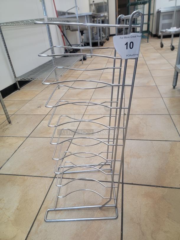 27" Heavy Duty Chrome Pizza Pan Rack - Maximize Your Pizza Output! Streamline your pizza production and storage with this robust 27-inch Heavy Duty Chrome Pizza Pan Rack, an essential piece of equipment for any pizzeria, restaurant, or high-volume kitchen that needs efficient storage and cooling for pizza pans. *BUYER MUST REMOVE - NO SHIPPING OR HANDLING AVAILABLE* - Image 1 of 1