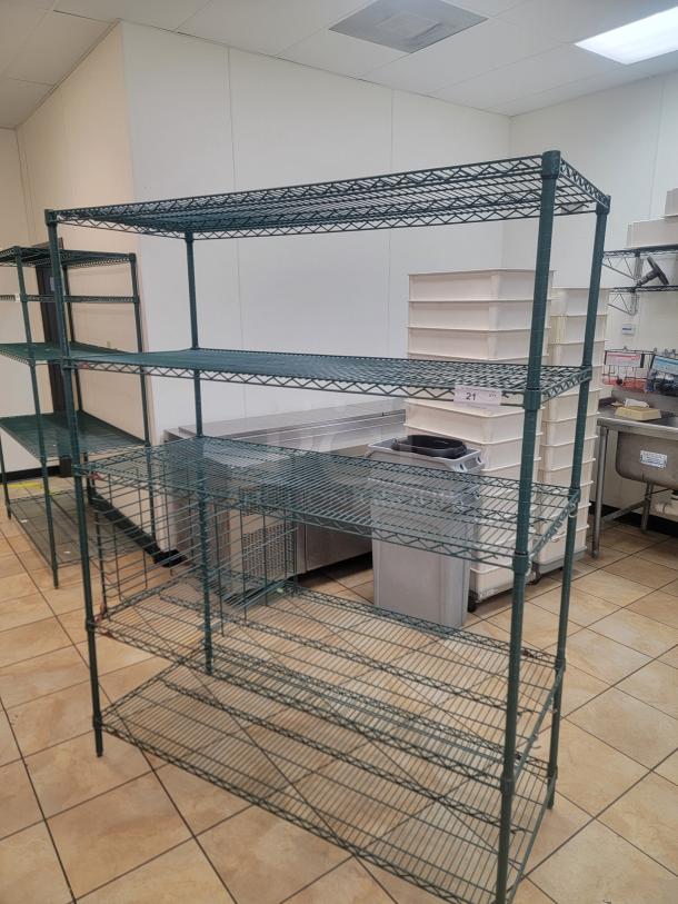 Green Focus NSF Metal Racking Shelves! Is your kitchen or pantry a chaotic mess? Get organized and boost your storage capacity with this fantastic rack! We're offering a 5-foot, 5-shelf  Commercial Grade Wire Rack with Adjustable Dividers, renowned for its durability and versatility. *BUYER MUST REMOVE - NO SHIPPING OR HANDLING AVAILABLE* - Image 1 of 3