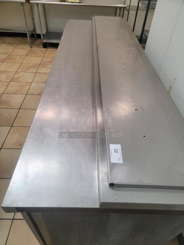 Randell 84111N-290 111" Pizza Prep Table w/ Refrigerated Base, 115v! Elevate your pizzeria's efficiency and product freshness with this massive pizza prep table! Designed for high-volume operations, this 111-inch workhorse provides ample space for preparing multiple pizzas simultaneously while keeping all your ingredients perfectly chilled and accessible. *BUYER MUST REMOVE - NO SHIPPING OR HANDLING AVAILABLE* - Image 2 of 6