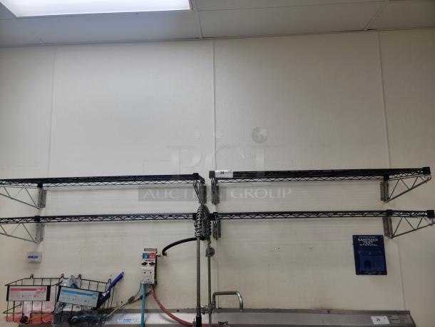 (4) Commercial Wire Wall Shelves - Optimize Your Space! Looking to maximize your storage and organization? We have (4) 4 Foot Shelves, perfect for any commercial kitchen, laboratory, healthcare facility, or even a highly organized home garage! *BUYER MUST REMOVE - NO SHIPPING OR HANDLING AVAILABLE* - Image 1 of 3