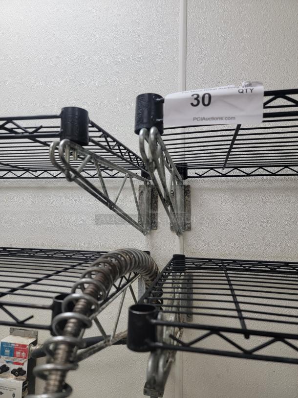 (4) Commercial Wire Wall Shelves - Optimize Your Space! Looking to maximize your storage and organization? We have (4) 4 Foot Shelves, perfect for any commercial kitchen, laboratory, healthcare facility, or even a highly organized home garage! *BUYER MUST REMOVE - NO SHIPPING OR HANDLING AVAILABLE* - Image 2 of 3