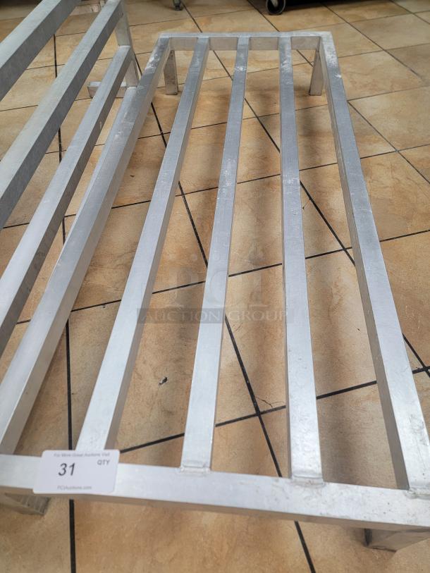New Age 5' 2020 Low Profile Dunnage Rack, metal, new condition, ideal for sanitary storage, "31 QTY" label visible.