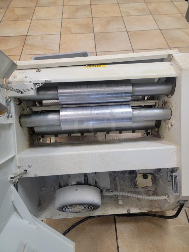 Anets SDR21 Two Stage Dough Roller - Needs TLC (Power Issue) The unit only turns on sometimes. We suspect the issue is with the power switch or a related electrical connection. When it does power on, the rollers operate as expected. This Anets SDR21 Two Stage Dough Roller is ideal for a baker or repair technician looking for a project. *BUYER MUST REMOVE - NO SHIPPING OR HANDLING AVAILABLE - Image 5 of 5