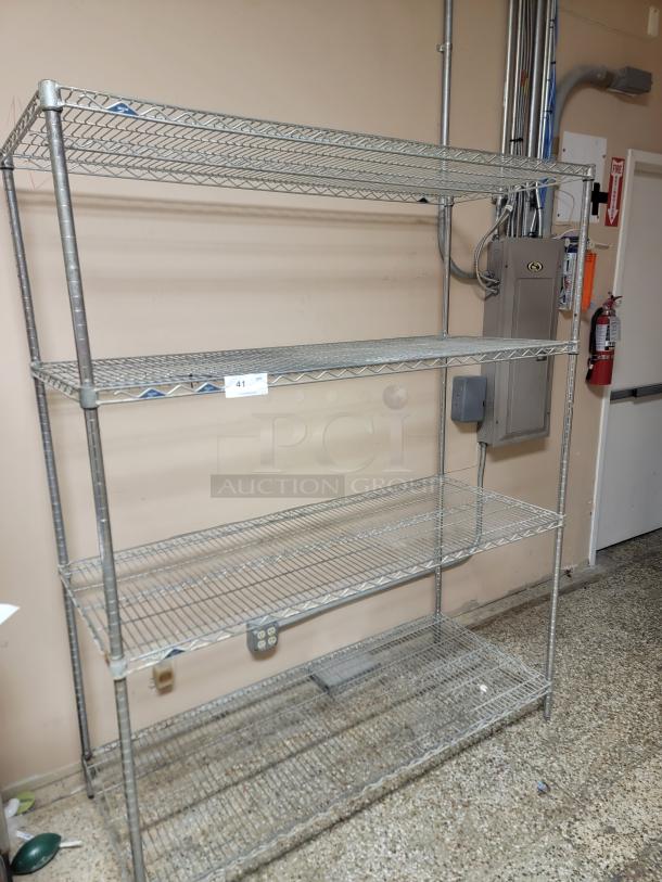 5' Metro Rack! Get organized – the ultimate solution for optimizing your storage space. This is ideal for restaurants, home kitchens, garages, pantries, or any place needing serious organization and immediate utility. *BUYER MUST REMOVE - NO SHIPPING OR HANDLING AVAILABLE* - Image 1 of 3