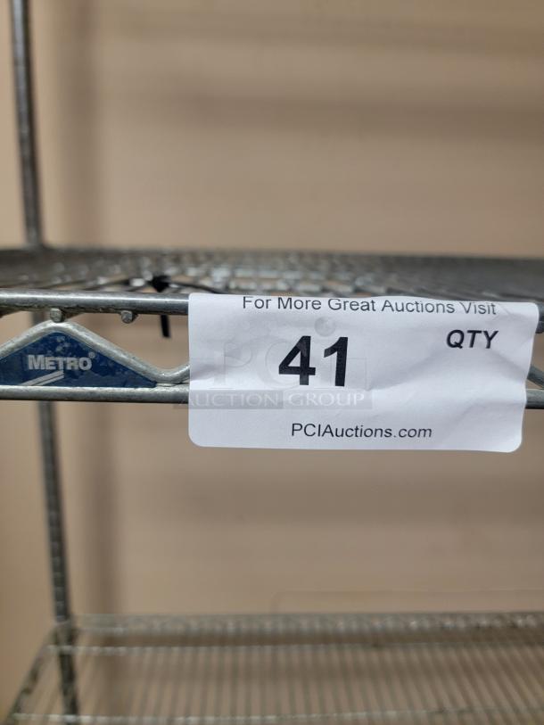 5' Metro Rack! Get organized – the ultimate solution for optimizing your storage space. This is ideal for restaurants, home kitchens, garages, pantries, or any place needing serious organization and immediate utility. *BUYER MUST REMOVE - NO SHIPPING OR HANDLING AVAILABLE* - Image 2 of 3
