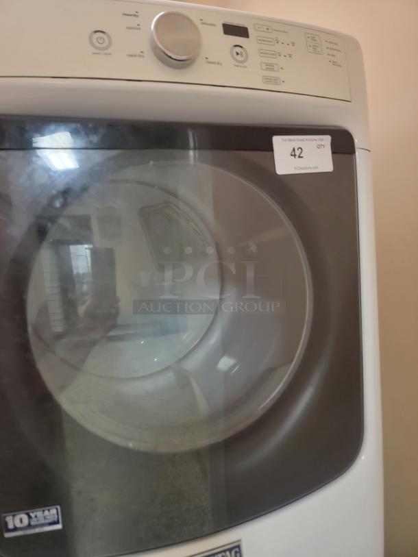 Maytag Electric Stackable Washer & Dryer Set - Efficient & Space-Saving! Fantastic Maytag electric stackable washer and dryer set, perfect for maximizing space in your laundry area! This reliable duo offers powerful cleaning and drying performance in a compact footprint. *BUYER MUST REMOVE - NO SHIPPING OR HANDLING AVAILABLE* - Image 2 of 7