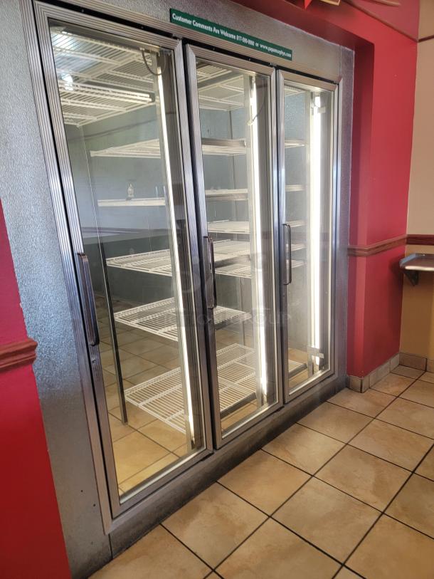 Imperial 18' SELF-CONTAINED Walk-in Cooler with 3 Glass Door Pass-Through & Bonus Shelving! Massive cold storage and display solution available! We're offering a fantastic deal on a 18-foot Imperial Super Insulated Walk-in Cooler, featuring a convenient 3-Glass Door Pass-Through for easy merchandising and access. As a special bonus, this package includes additional shelving to get you organized right away! See video in description below 👇- *BUYER MUST DISASSEMBLE AND REMOVE - NO SHIPPING OR HANDLING AVAILABLE* - Image 4 of 16