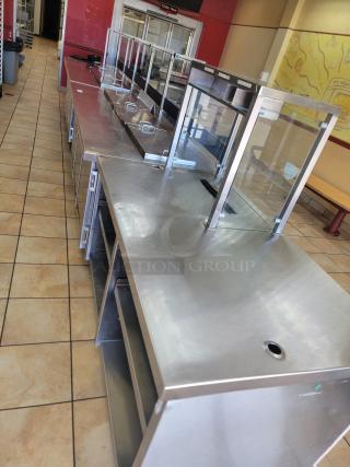 Wasserstrom 21-Foot Refrigerated Prep Table with Cold Food Wells - Massive Capacity! Revolutionize your kitchen's prep and cold storage! We're offering an impressive 21-foot Refrigerated Prep Table with integrated Cold Food Wells, the ultimate solution for high-volume sandwich, salad, pizza, or assembly lines. This is a must-have for large restaurants, delis, catering operations, or institutional kitchens that demand efficiency and ample refrigerated storage. See Video in Description Below 👇*BUYER MUST REMOVE - NO SHIPPING OR HANDLING AVAILABLE*