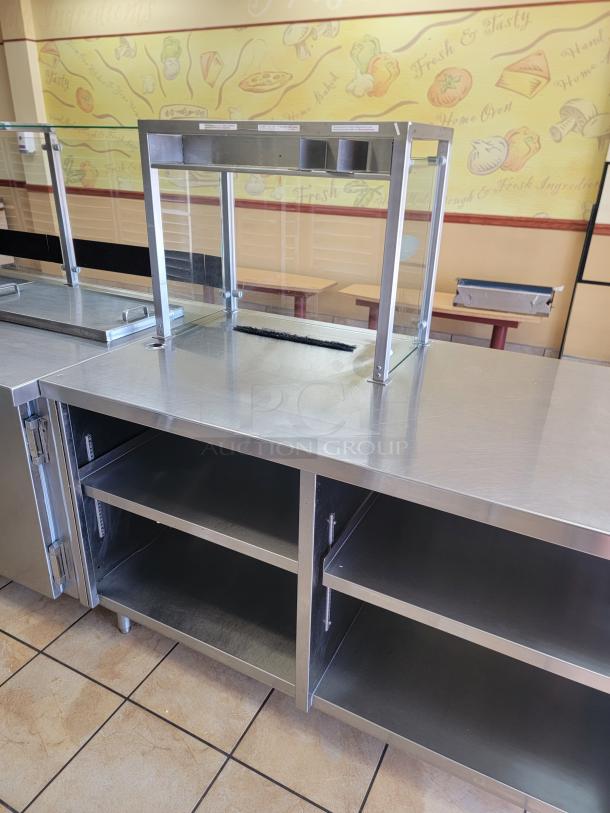 Wasserstrom 21-Foot Refrigerated Prep Table with Cold Food Wells - Massive Capacity! Revolutionize your kitchen's prep and cold storage! We're offering an impressive 21-foot Refrigerated Prep Table with integrated Cold Food Wells, the ultimate solution for high-volume sandwich, salad, pizza, or assembly lines. This is a must-have for large restaurants, delis, catering operations, or institutional kitchens that demand efficiency and ample refrigerated storage. See Video in Description Below 👇*BUYER MUST REMOVE - NO SHIPPING OR HANDLING AVAILABLE* - Image 2 of 9