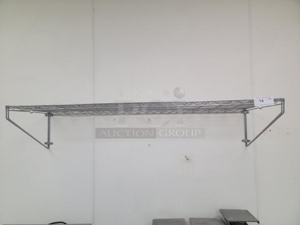 5' Chrome Metal Commercial Shelf - Optimize Your Space! Looking to maximize your storage and organization? This 5' wall durable wall shelf is perfect for any commercial kitchen, laboratory, healthcare facility, or even a highly organized home garage! *BUYER MUST REMOVE - NO SHIPPING OR HANDLING AVAILABLE* - Image 1 of 2