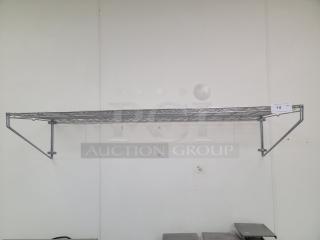 5'x18"x11" chrome wall shelf, sturdy wiring, excellent condition, includes mounting brackets, auction tag number 14 visible.