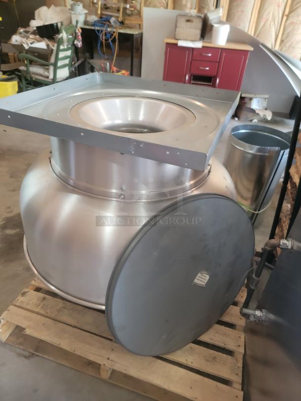 Industrial stainless steel ventilation fan, large size, new condition, mounted on wooden pallet, visible manufacturer's label.