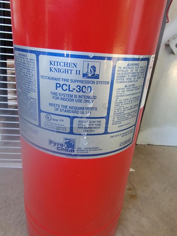 Red Kitchen Knight II PCL-300 fire suppression system, designed for indoor restaurant use, meets UL300 standards.