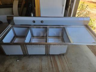 Stainless steel commercial refrigerator prep table with six compartments. Light wear visible. No labels or markings.