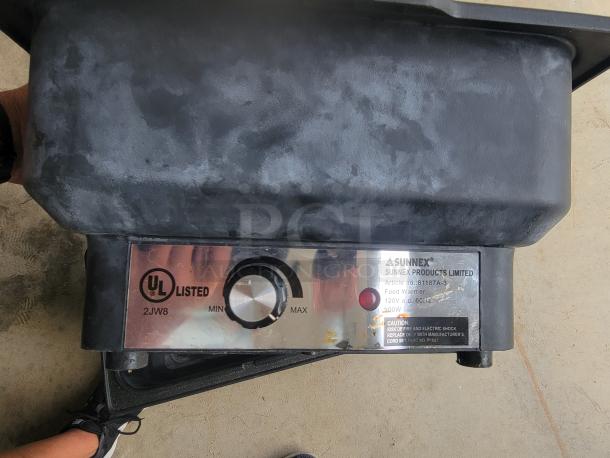 Sunnex food warmer, model 818187A-3, UL listed, 120V, 900W, with adjustable dial. Wear visible on surface.
