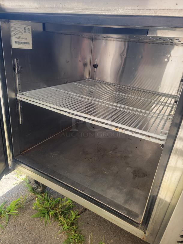 Atosa MPF8201 Commercial Mega Top Refrigerated Prep Table! Maximize your kitchen's efficiency and prep space with this fantastic Atosa MPF8201 Mega Top Refrigerated Sandwich/Salad Prep Table! Perfect for delis, pizzerias, cafes, and restaurants, this unit combines refrigerated storage with a convenient prep area, making it ideal for fast-paced food service. - Image 3 of 6