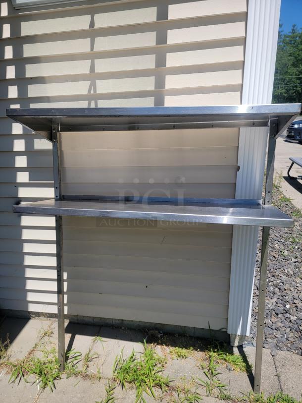 Versatile Stainless Steel Double Over shelf (4'x16", Adjustable to 5' tall!) Need extra storage and organization in your commercial kitchen, workshop, or garage? This high-quality stainless steel double over shelf is the perfect solution to maximize your vertical space! - Image 1 of 5