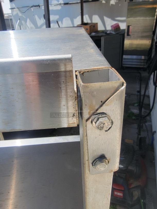 Versatile Stainless Steel Double Over shelf (4'x16", Adjustable to 5' tall!) Need extra storage and organization in your commercial kitchen, workshop, or garage? This high-quality stainless steel double over shelf is the perfect solution to maximize your vertical space! - Image 4 of 5