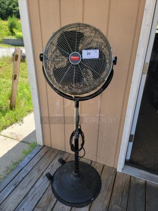 Dayton 2LY94B Industrial Pedestal Fan with sturdy metal blades and base, adjustable height, visible Dayton label, good condition.