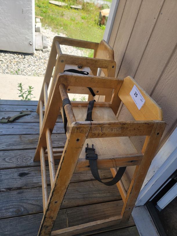Two Sturdy Wooden Restaurant High Chairs - Perfect for Your Establishment! Need reliable and classic seating for your youngest diners? We're selling two well-maintained wooden restaurant high chairs, ideal for cafes, diners, family restaurants, or any establishment that welcomes families.

These chairs offer a safe and comfortable seating solution, blending seamlessly with most restaurant decors. They're built for durability and ease of cleaning, standing up to daily commercial use. - Image 2 of 2