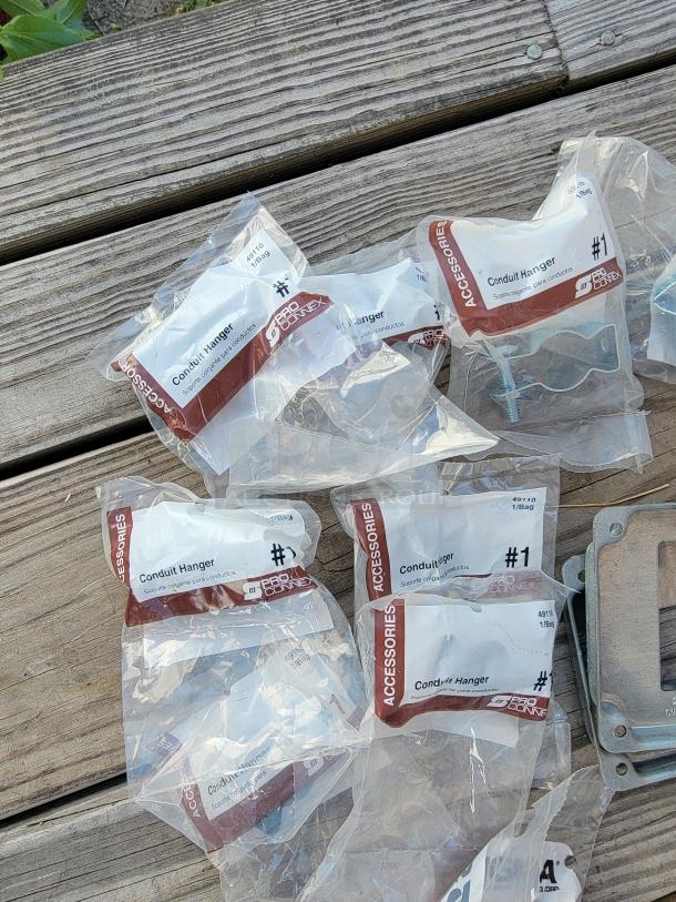 ProConnex Conduit Hangers in packaging, ideal for electrical projects. Includes multiple pieces, new condition.