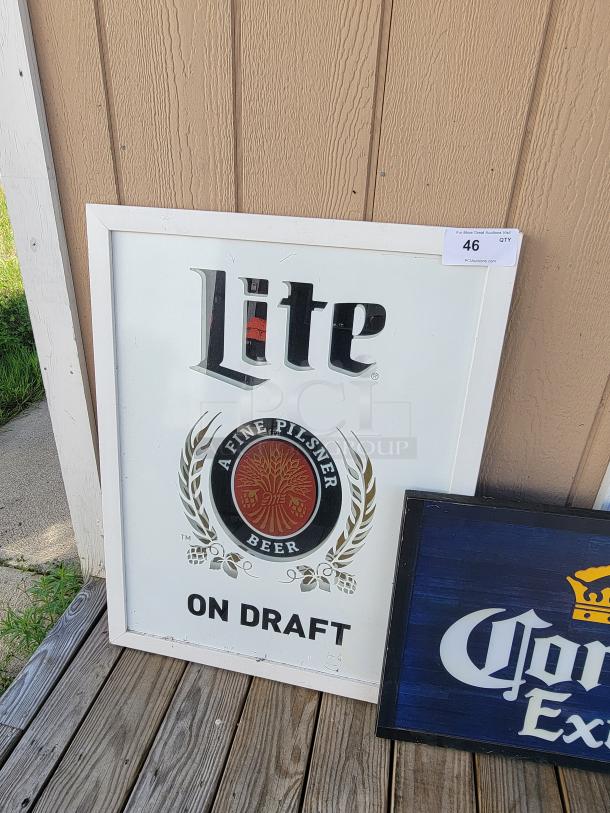 Miller Lite "On Draft" mirror sign with "Lite" logo and "A Fine Pilsner Beer" crest. Framed, vintage style, ready to hang.