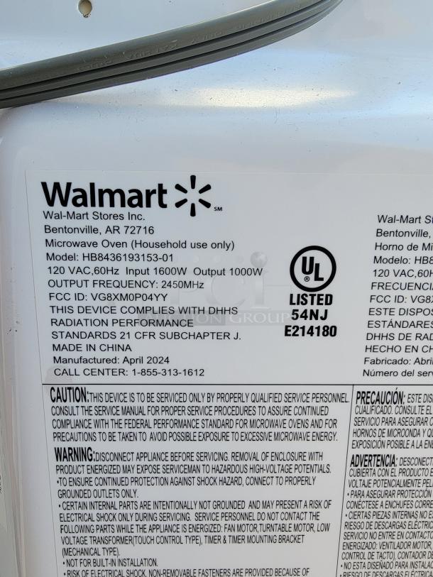 Hamilton Beach 1.1 cu. ft. countertop microwave, model HB8436193153-01, 1000W output, manufactured April 2024, made in China.
