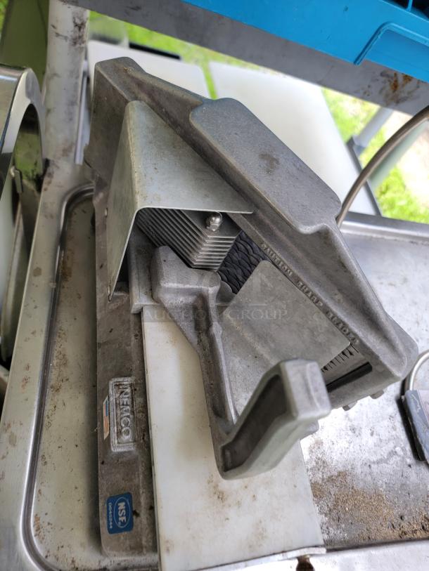 NEMCO vegetable slicer with stainless steel blades; visible wear. Tags indicate NSF certification.