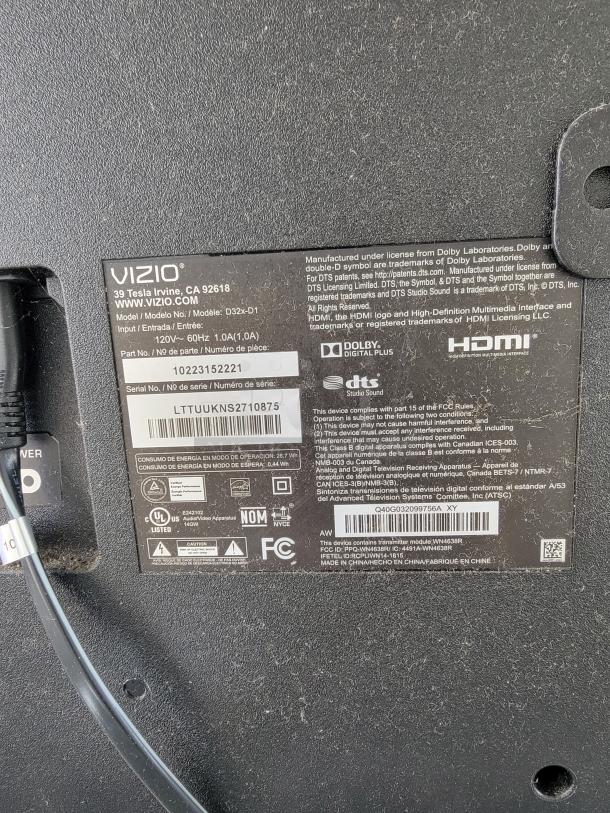 Vizio 32-inch D-Series HD LED Smart TV, Model D32f-D1, back view showing label with specs and serial number.