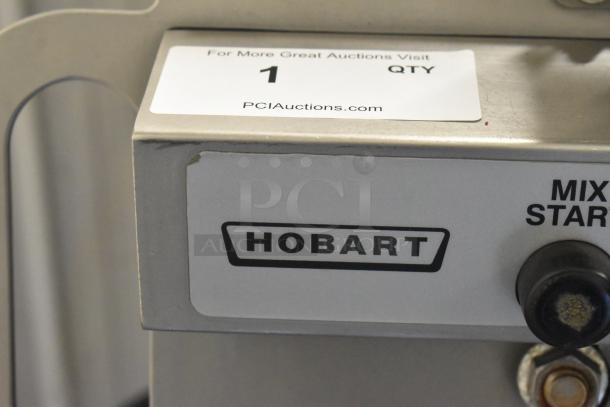 Hobart MG2032 meat mixer grinder, electric, commercial floor model, featuring foot pedal and casters, 208V, 3-phase.