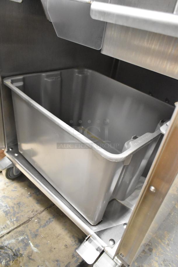 JBT 2ND-GEN-MFJ-HE citrus juicer, stainless steel, commercial casters, 120 volts, excellent condition.