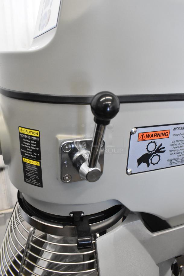 2023 Globe SPC40 40 Qt Planetary Dough Mixer with bowl, guard, hook, whisk, paddle. Tags: caution and warning labels.