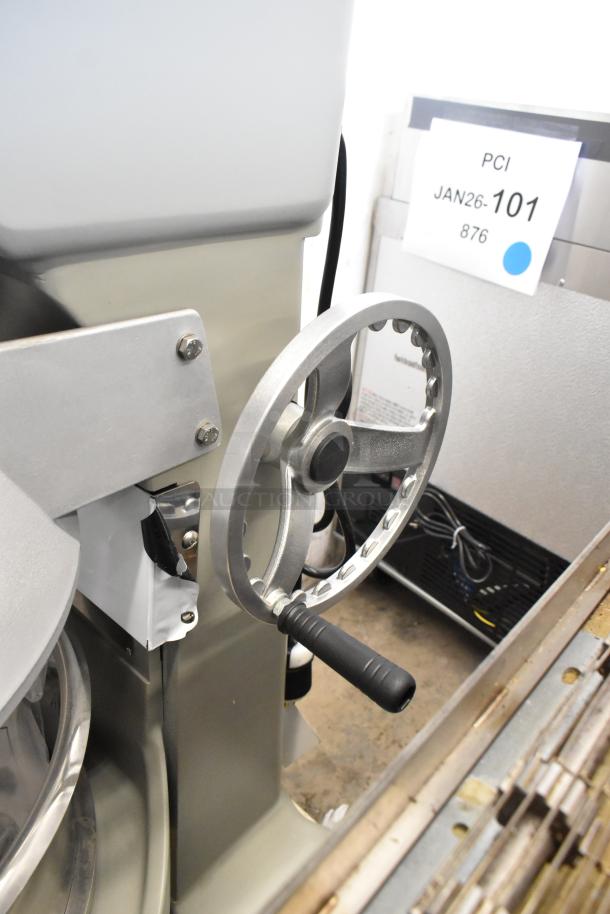 Globe SPC40 planetary dough mixer, 40-quart capacity, mixing bowl, guard, attachments. 208V, 3-phase. Control wheel shown.