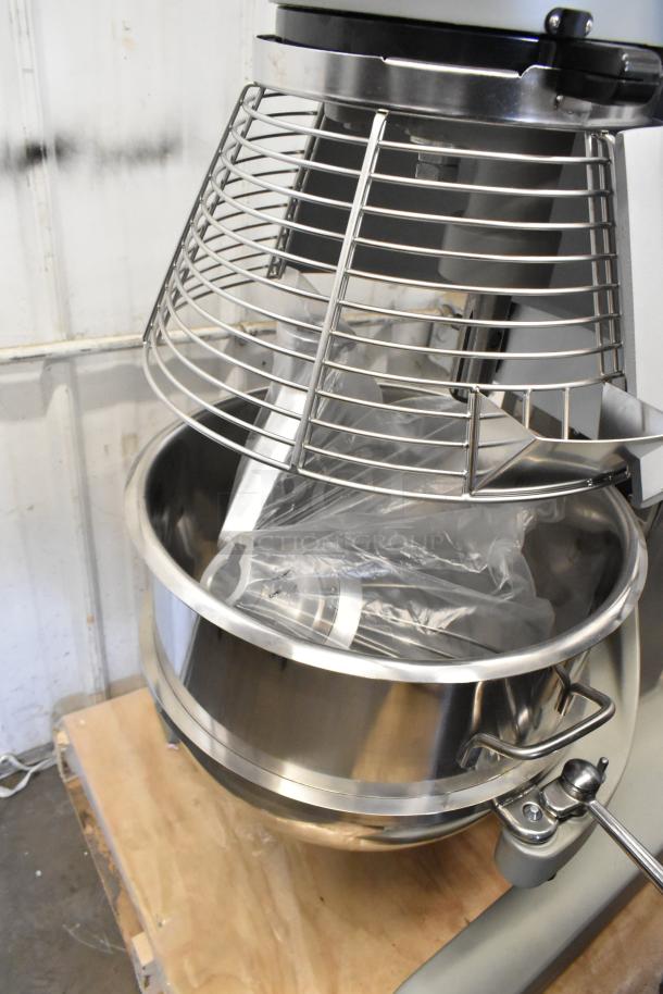 2023 Globe SPC40 40 Quart Dough Mixer with bowl, guard, hook, whisk, paddle, 208V, 3-phase, new condition.