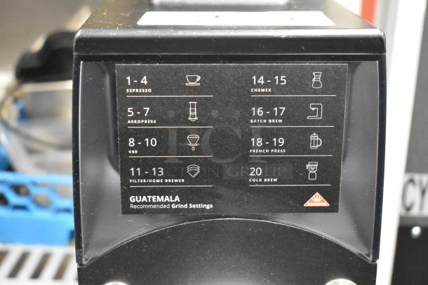 2025 Mahlkonig Guatemala coffee grinder with grind settings chart; commercial countertop model, 2 lb. capacity, 120 volts.