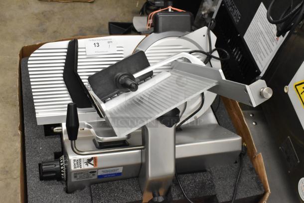 Brand new Globe SG13A-24 automatic meat slicer with 13" blade, built-in sharpener; slight scratches; 110V, 1 Phase.