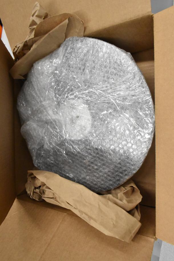 New Globe SG13A-24 meat & cheese slicer in box, wrapped in bubble wrap. Includes 13" blade, blade sharpener. 110V, 1 Phase.