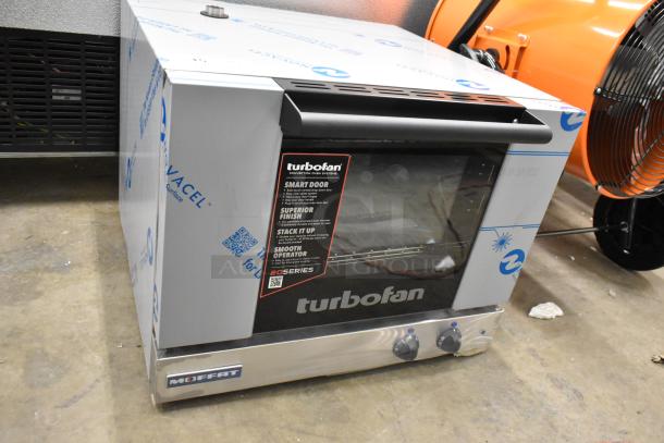 Brand new Moffat E22M3 Turbofan half-size convection oven. Manual/electric, porcelain chamber, 120V, 1 phase, scratch and dent.