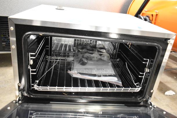 BRAND NEW Moffat E22M3 Turbofan half-size countertop convection oven; porcelain chamber, 120V, 1 phase. Scratch and dent condition.