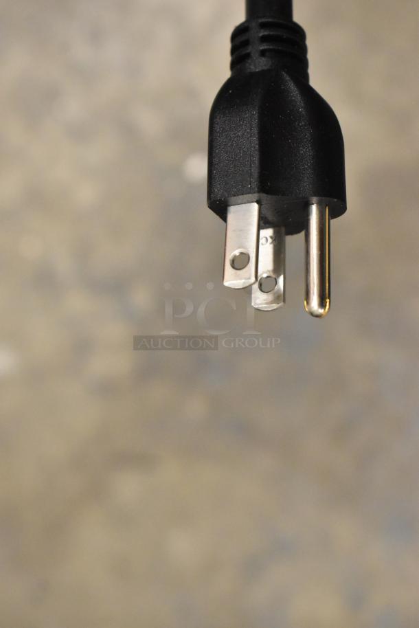 Close-up of a three-prong plug for the Moffat E22M3 countertop convection oven, 120 volts, 1 phase.