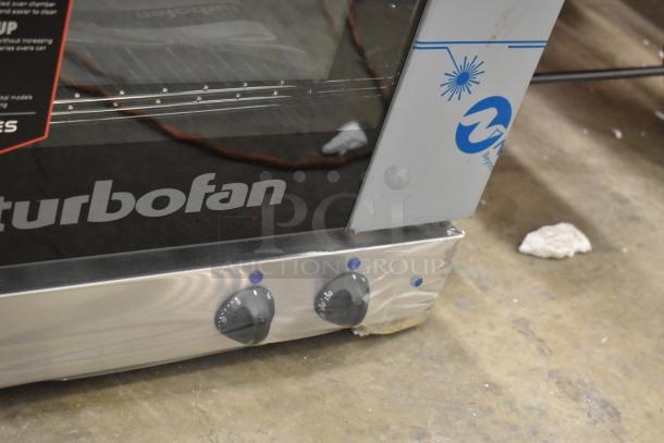 Brand new Moffat E22M3 Turbofan half-size convection oven, porcelain chamber, minor scratches, 120V, 1 phase.
