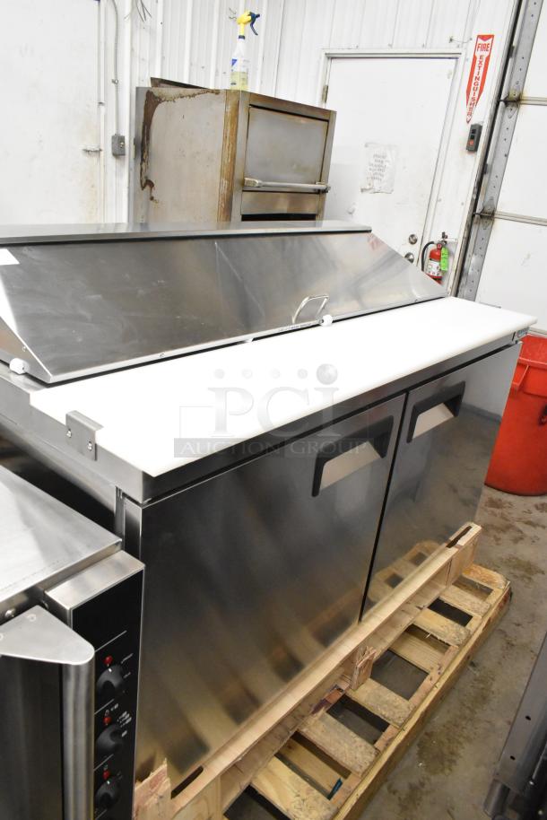 Brand new Avantco 178APT60HC commercial sandwich salad prep table, stainless steel, scratch and dent, 115V, 1 phase.