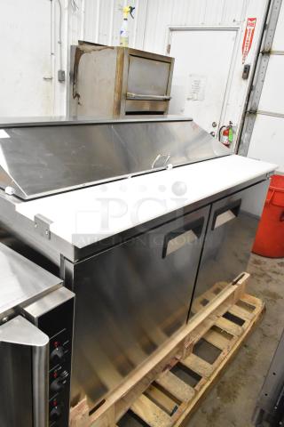 Brand new Avantco 178APT60HC commercial sandwich salad prep table, stainless steel, scratch and dent, 115V, 1 phase.
