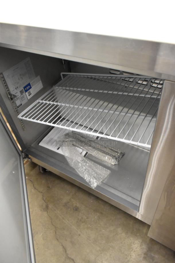 Brand new Mainstreet 829PT60 sandwich prep table, scratch and dent. Features commercial casters, wired shelves, 115V, 1 Phase.