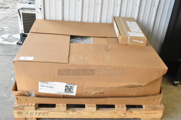Brand new Moffat VHIK35 ventless hood in original packaging on pallet, with visible shipping labels and model details.